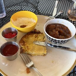 Dutch baby with apple compote and whipping cream Dutch baby with apple compote and whipping cream