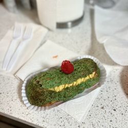 Pistachio raspberry eclair
