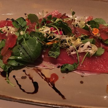 Ninety Acres - Coppa (cured, marinated pork), watermelon soaked in mint), watercress, and an awesome achiote sauce - New American Near Me - Peapack, New Jersey Ninety Acres - Coppa (cured, marinated pork), watermelon soaked in mint), watercress, and an awesome achiote sauce - New American Near Me - Peapack, New Jersey