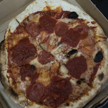 MOD Pizza - Burnt garlic all over the pizza. - Fast Food Near Me - Richland, Washington