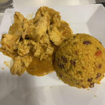 Tropical Taste Restaurant - Chicken plate with yellow rice - Puerto Rican Near Me - San Juan, Puerto Rico