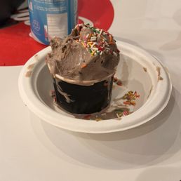 Overflowing the cup, so we had to pay $.25 for a bowl to hold our bowl... terrible customer service.