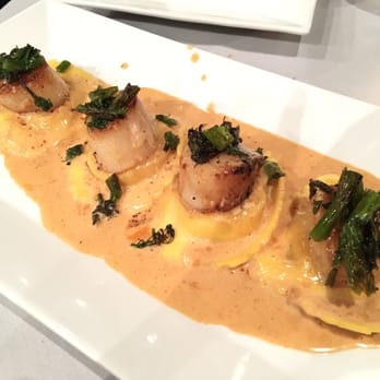 Paragon Tap & Table - Lobster ravioli with scallops. Scallops were fishy. Sauce was spicy and on point. - New American Near Me - Clark, New Jersey