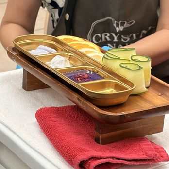Crystal Nails & Spa RDL - This wasn't my pedicure tray, but the lotion, scrub, and salts arrive on this tray. Presentation is amazing. - Nail Salons Near Me - Redlands, California Crystal Nails & Spa RDL - This wasn't my pedicure tray, but the lotion, scrub, and salts arrive on this tray. Presentation is amazing. - Nail Salons Near Me - Redlands, California