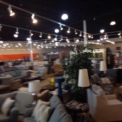 Kittle's Furniture - Lafayette - Showroom view with blurry effect, similar to the vision you'll have after looking at 23 sofa choices.