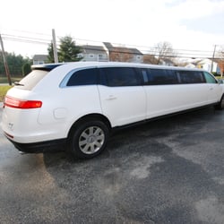 Geiger's Limousine & Transportation - White Lincoln MKT Limousine exterior