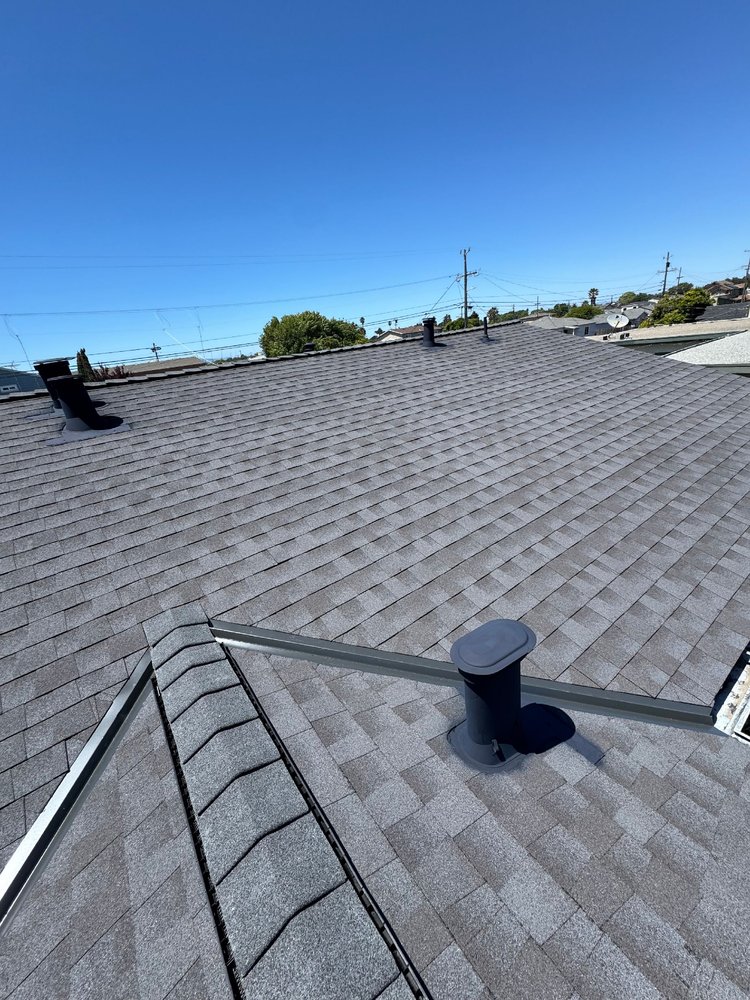 Slide of Acme Roofing Services