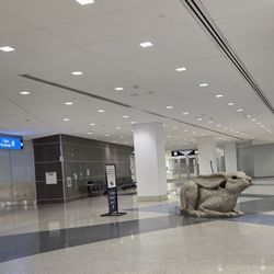 JetBlue - Sculpture meets you at exit to luggage area.