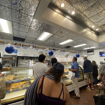 Mike's Pastry - All flavors are across the top of the wall - Bakeries Near Me - Boston, Massachusetts Mike's Pastry - All flavors are across the top of the wall - Bakeries Near Me - Boston, Massachusetts