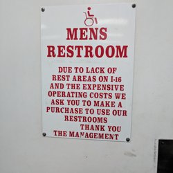 Chevron - "Due to the lack of rest areas on I-16 and the expensive operating costs we ask you to make a purchase to use our restrooms."