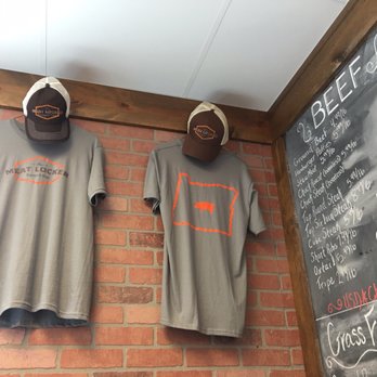 The Meat Locker - two t - shirts hanging on a brick wall - Butcher Near Me - Bend, Oregon The Meat Locker - two t - shirts hanging on a brick wall - Butcher Near Me - Bend, Oregon