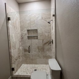 Beautiful shower glass doors for our remodeled guest bathroom. Beautiful shower glass doors for our remodeled guest bathroom.