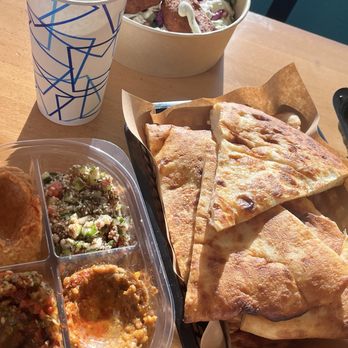 Zaria - Sampler w naan mound and falafel bowl - Mediterranean Near Me - St. Augustine, Florida Zaria - Sampler w naan mound and falafel bowl - Mediterranean Near Me - St. Augustine, Florida