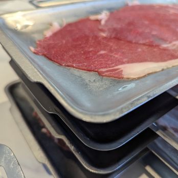 Shabuya - Is this sliced0.5 mm thick? so paper thin... i could not differentiate between cuts of beef or if beef and pork... when cooked in hotpot. - Japanese Near Me - Kapolei, Hawaii Shabuya - Is this sliced0.5 mm thick? so paper thin... i could not differentiate between cuts of beef or if beef and pork... when cooked in hotpot. - Japanese Near Me - Kapolei, Hawaii