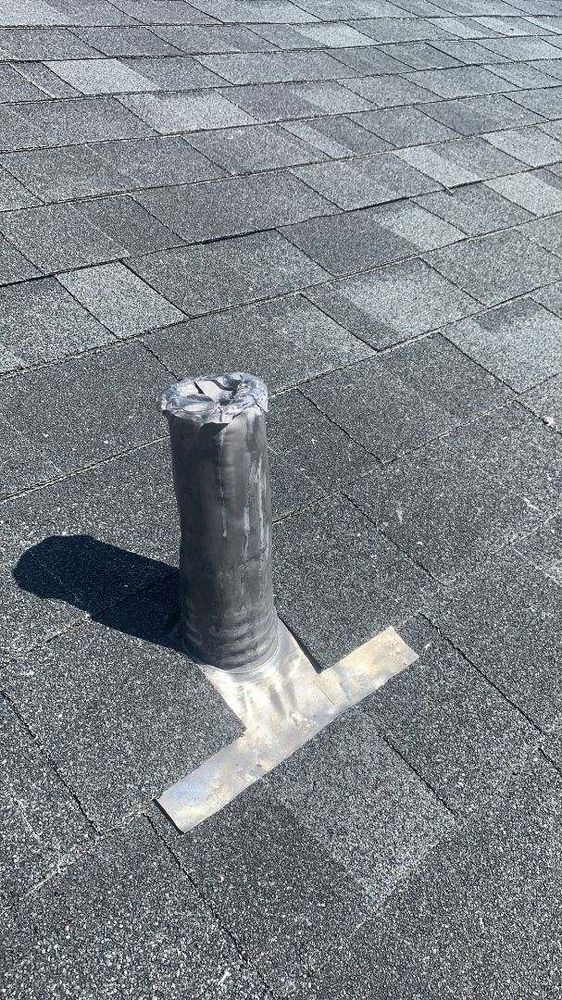 Slide of E. Thompson Roofing