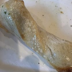 Luigi's Pizza and Catering - They serve breadknots automatically. In garlic oil butter sauce. Delicious.