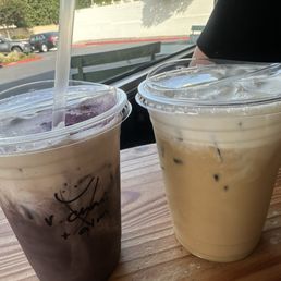 Ube latte with vanilla cream top and pandan latte with coconut cream top