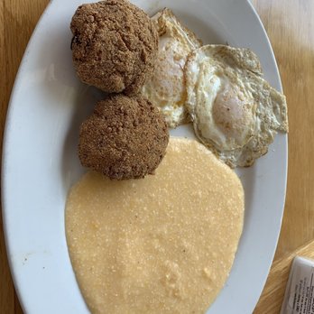 The Arnett Cafe - Salmon croquettes, cheese grits, two eggs over easy. - Southern Near Me - Rochester, New York The Arnett Cafe - Salmon croquettes, cheese grits, two eggs over easy. - Southern Near Me - Rochester, New York
