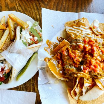 Universal Joint - Gyro and Buffalo Chicken Nachos. Perfectly paired with half & half tea. LOL. - Burgers Near Me - Clayton, Georgia Universal Joint - Gyro and Buffalo Chicken Nachos. Perfectly paired with half & half tea. LOL. - Burgers Near Me - Clayton, Georgia