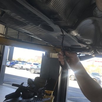 Auto International Repair Center - O2 sensor in the mechanics hand. - Auto Repair Near Me - Annapolis, Maryland Auto International Repair Center - O2 sensor in the mechanics hand. - Auto Repair Near Me - Annapolis, Maryland