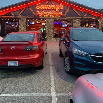 Sammy's Tap & Grill - two cars parked in front of the restaurant - Sports Bars Near Me - Raleigh, North Carolina Sammy's Tap & Grill - two cars parked in front of the restaurant - Sports Bars Near Me - Raleigh, North Carolina