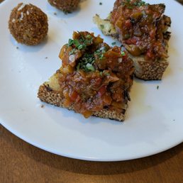Mushroom Arrancini and Eggplant Crostini. Mushroom Arrancini and Eggplant Crostini.