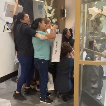 LaVi Nails - Workers gathering at the front to take photos with Nordstrom bags as costumers wait for their nails to be finished.. - Nail Salons Near Me - Paramus, New Jersey