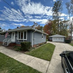 Precision Roofing Contractors of America - After. New roof, siding and gutters!
