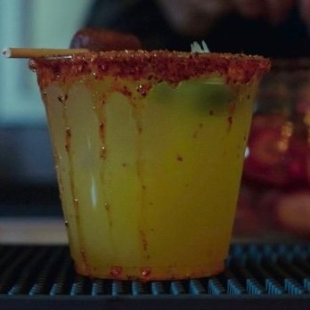 Prime Bar Services - This delicious little gem right here is a Mango Madness - Bartenders Near Me
