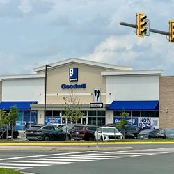 Goodwill - Outside / Exterior of shop - near Enterprise, DQ, 7-11 near Church & Davis Dr - donation drive thru conveniently located on side of bldg