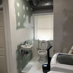 Hammer & Nails - Bathroom installation in progress.