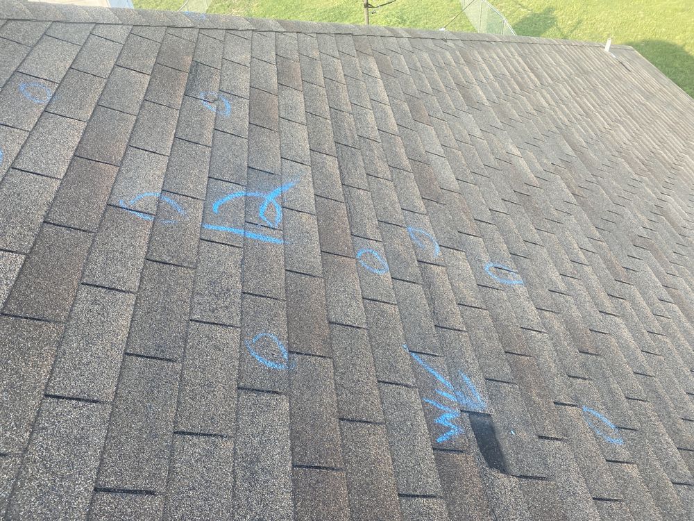 Slide of Strain Roofing