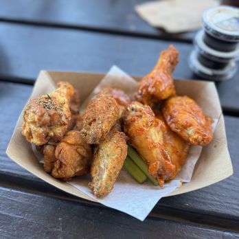 Revolutionary Wings - Cajun Wings (Left) & Citrus Buffalo (Right) - Chicken Wings Near Me - San Antonio, Texas Revolutionary Wings - Cajun Wings (Left) & Citrus Buffalo (Right) - Chicken Wings Near Me - San Antonio, Texas