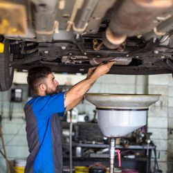 Clair & Dee's Point S - Under car services.