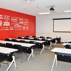 Keller Williams Realty - KW is the #1 Training Company in the world! With that being said, we have a great training room for our agents to learn and grow.