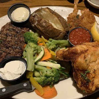 Fireside Grille - Pick 3: 8oz Top Sirloin, Broasted Pork Chop, Fried Gulf Shrimp, Baked Potato, Fresh Vegetables. - American Near Me - Sugar Grove, Illinois Fireside Grille - Pick 3: 8oz Top Sirloin, Broasted Pork Chop, Fried Gulf Shrimp, Baked Potato, Fresh Vegetables. - American Near Me - Sugar Grove, Illinois