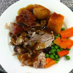 A1 Roast - Roasted pork, pumpkin, potato, sweet potato, carrots and peas topped off with gravy