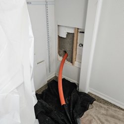 A River City Plumbing - Sleeve for new water service inside home.