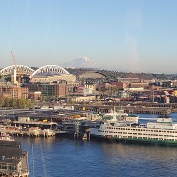 The Seattle Great Wheel - View of the docks and Mount Rainier in the distance - Amusement Parks Near Me - Seattle, Washington The Seattle Great Wheel - View of the docks and Mount Rainier in the distance - Amusement Parks Near Me - Seattle, Washington