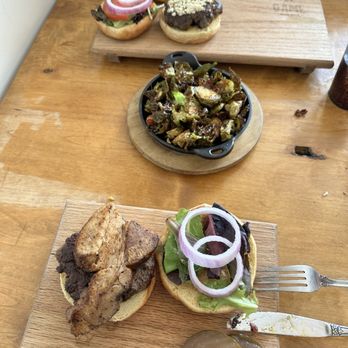 GAME on the River - Thai Brussel sprouts and the Wagyu burger with homemade sweet pickles - Burgers Near Me - Jeffersonville, Indiana GAME on the River - Thai Brussel sprouts and the Wagyu burger with homemade sweet pickles - Burgers Near Me - Jeffersonville, Indiana