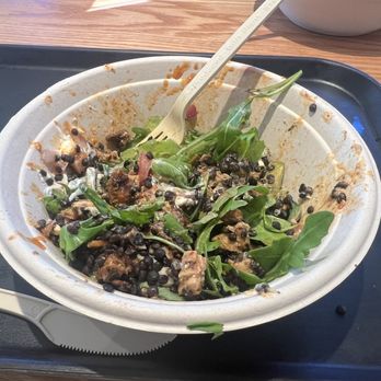 CAVA - a bowl of food with a fork in it - Mediterranean Near Me - Waco, Texas
