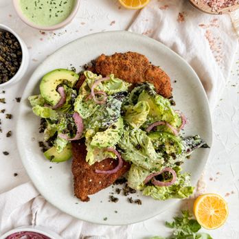 Fed & Full - Crispy chicken, green goddess salad with avocado, pickled red onions and fried capers - Personal Chefs Near Me Fed & Full - Crispy chicken, green goddess salad with avocado, pickled red onions and fried capers - Personal Chefs Near Me
