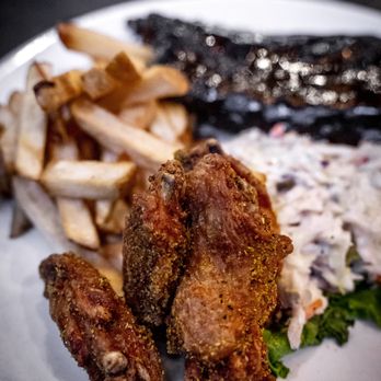 Gabby's - Baby Back Ribs & Wings
Fall-off-the-bone slow-cooked Baby back Pork Ribs in our signature BBQ sauce. Served with fries and our house slaw. - Bars Near Me - Toronto, Ontario Gabby's - Baby Back Ribs & Wings
Fall-off-the-bone slow-cooked Baby back Pork Ribs in our signature BBQ sauce. Served with fries and our house slaw. - Bars Near Me - Toronto, Ontario