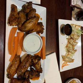 Roadhouse - Mixture of wing sauces, crab poppers, and pot stickers. - Sports Bars Near Me - Woodbridge, Virginia Roadhouse - Mixture of wing sauces, crab poppers, and pot stickers. - Sports Bars Near Me - Woodbridge, Virginia