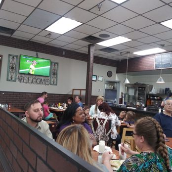 Delta Coney Island - a group of people sitting at a table - American Near Me - Monroe, Michigan