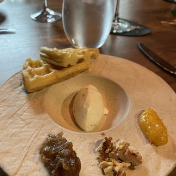 Partage - Whipped Goat Cheese with homemade waffles, caramelized onions, nuts and marmalade. - French Near Me - Las Vegas, Nevada