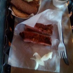Rudy's "Country Store" and Bar-B-Q - Rudy's pork ribs had flavor but were tough and chewy. Brisket sandwich had meat a little dry.