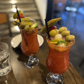 Hungry Goat Scratch Kitchen & Wine Bar - Bloody Mary - one spicy and one regular! - Wine Bars Near Me - Morrison, Colorado Hungry Goat Scratch Kitchen & Wine Bar - Bloody Mary - one spicy and one regular! - Wine Bars Near Me - Morrison, Colorado
