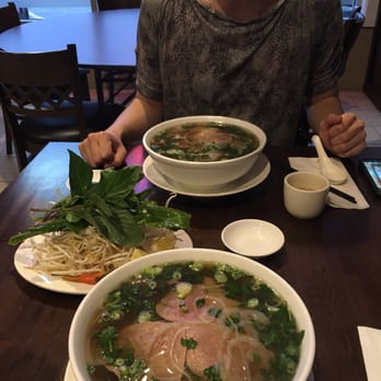 Pho Minh - #30 pho (large) with tea cup for scale. Slightly sweet broth, but quite good. - Vietnamese Near Me - Randolph, Massachusetts Pho Minh - #30 pho (large) with tea cup for scale. Slightly sweet broth, but quite good. - Vietnamese Near Me - Randolph, Massachusetts