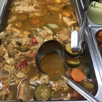 San Eduardo - a variety of food items in a buffet - Delis Near Me - Hicksville, New York